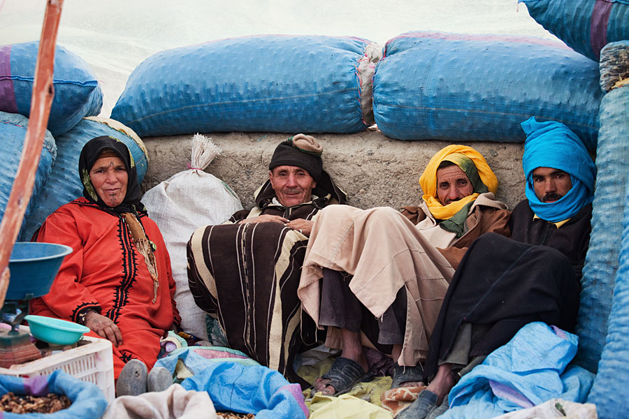  Seeking shelter for the elements while selling peanuts   Imilchil market   Morocco